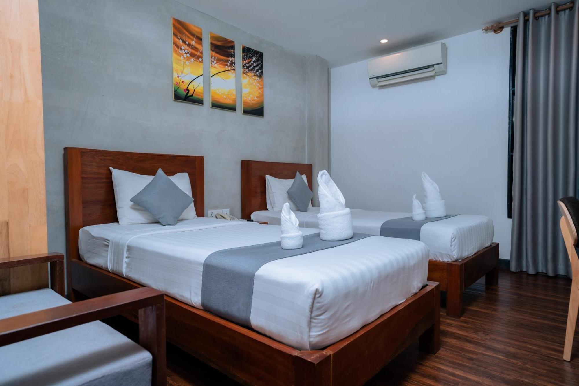 Home Chic Hotel Phnom Penh Bagian luar foto
