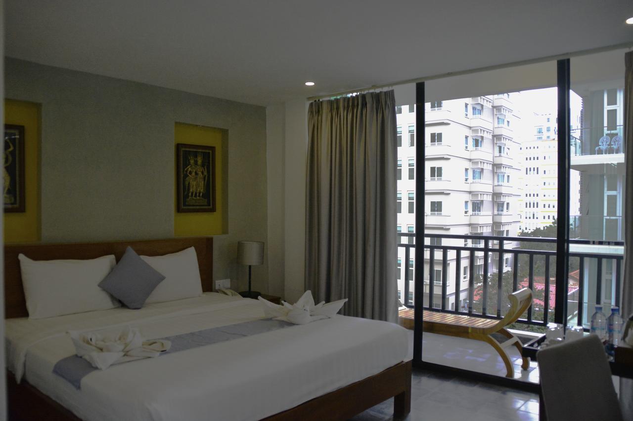 Home Chic Hotel Phnom Penh Bagian luar foto